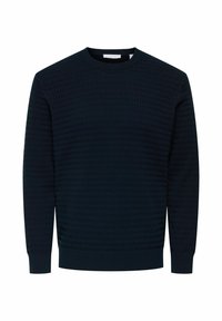 Sweat-shirt bleu marine avec un motif texturé, col rond et manches longues. Comprend des poignets et un ourlet côtelés pour un design ajusté. Matière en mélange de coton.