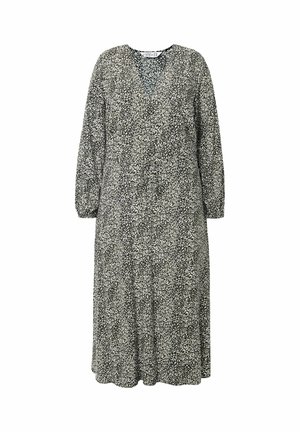 Abito a righe bianche e nere con maniche lunghe, scollatura a V e una vestibilità ampia. Realizzato in tessuto leggero con un aspetto testurizzato.