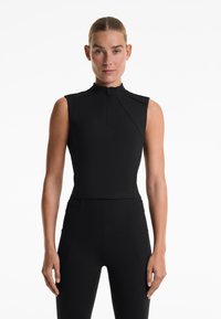OYSHO EVERMOVE CREASE - Top - black