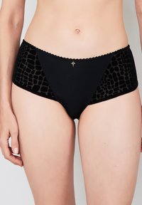 Black hipster briefs featuring a smooth front with textured animal print sides, scalloped detailing along the waistband, and a small metallic accent.