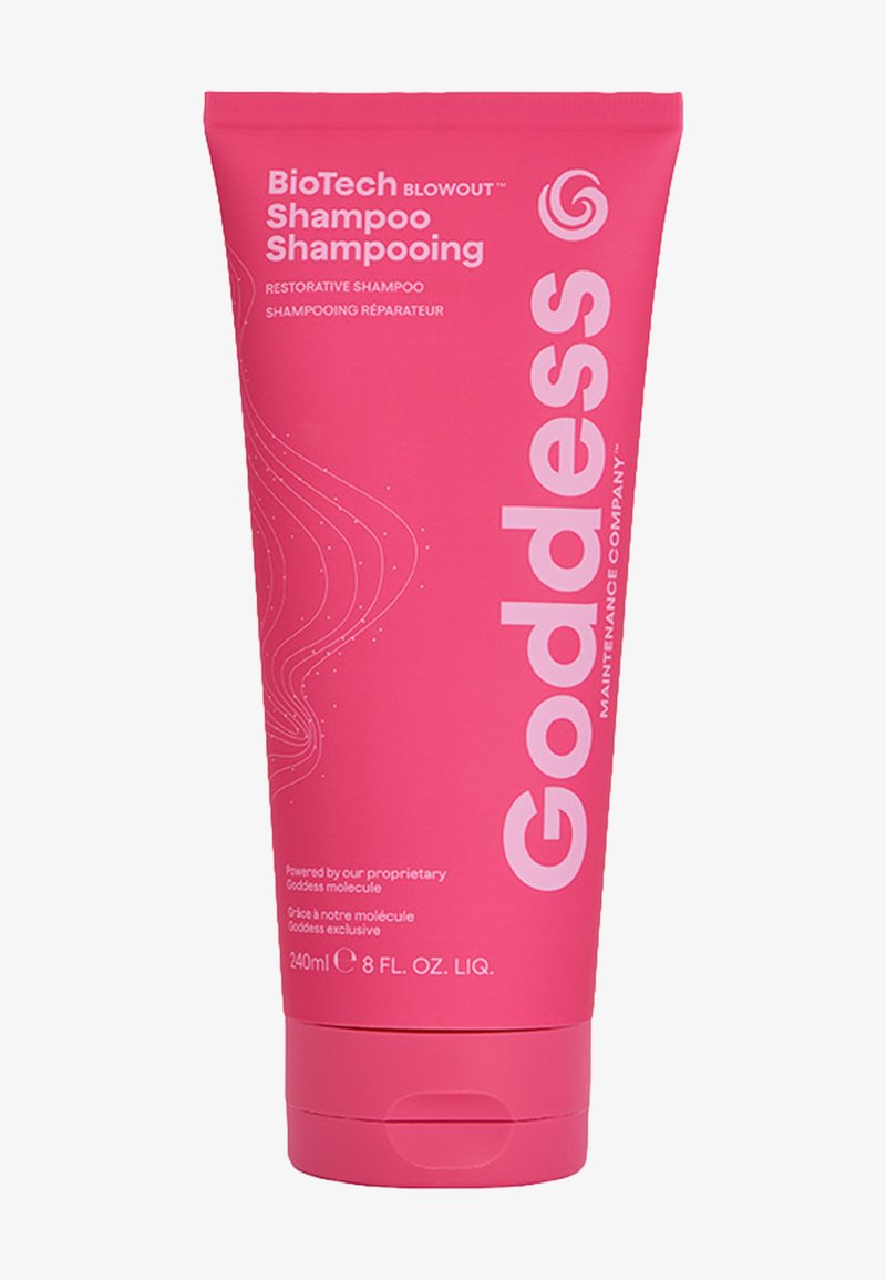 Tube rose vif de shampooing réparateur BioTech Blowout de Goddess Maintenance Company, 240 ml, avec texte blanc et design ondulé subtil.