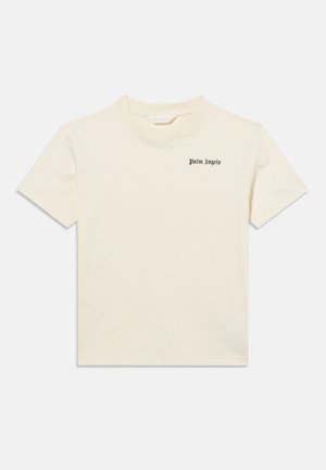 Short-sleeve cream crewneck T-shirt with small black "Palm Angels" logo on the left chest, laid flat on a white background.