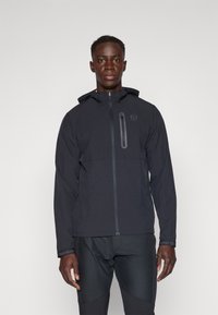 Mustang, kapuutsiga must kerge jakki. Valmistatud kergest materjalist, millel on rinna tasku ja peegeldavad aksessuaarid varrukatel ja tõmblukul.