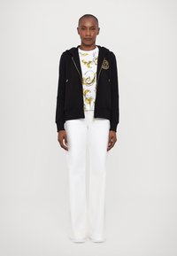 Versace Jeans Couture Športna jopa s kapuco na zadrgo - black/gold