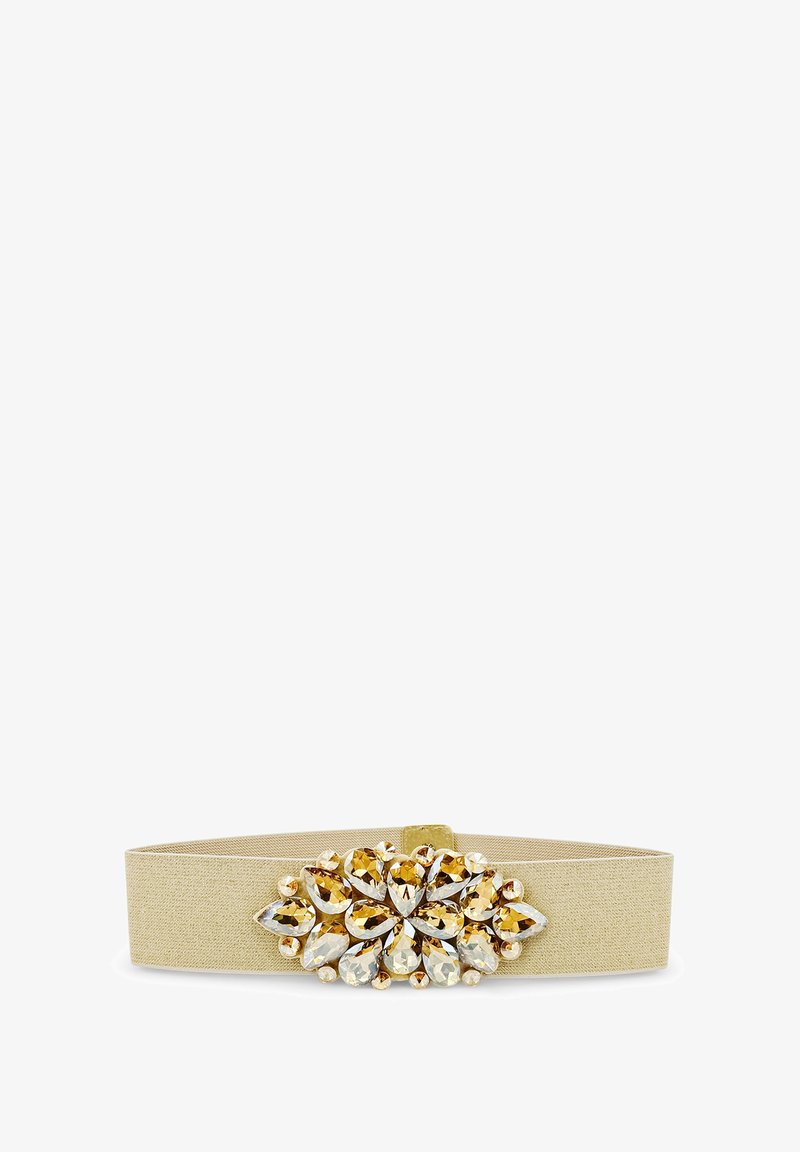 Cintura elastica beige con un cluster centrale di gemme a forma di goccia e rotonde, in oro e trasparente, disposte a forma di fiore.