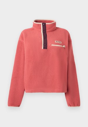 Lososově růžový fleecový pulovr s vysokým límcem, knoflíkovou légou, krémovým lemováním a zipovou kapsou na hrudi s logem Columbia.