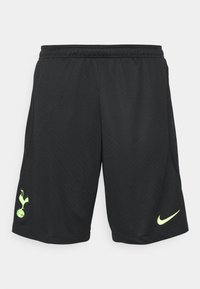 Svarta sportshorts gjorda av lättviktig tyg, med ett texturerat mönster, elastisk midja och en grön logotyp på vänster ben.