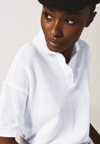 Champion WILD THINGS - Polo - white