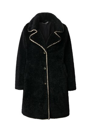 Abrigo de piel sintética negro con un amplio cuello, decorado con costuras en beige que contrastan a lo largo de los bordes, con botones frontales y bolsillos laterales.