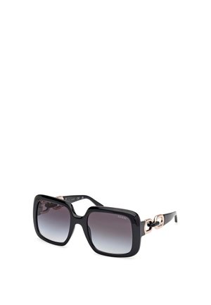 Lunettes de soleil carrées avec des montures en plastique noir brillant, des verres gris dégradés et des accents métalliques rose gold sur les branches.