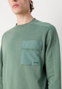 BOSS POCKETCARGO - Felpa - open green