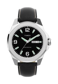 Timex rankinės laikrodžio su juodu odiniu dirželiu, sidabriniu aštuonkampiu korpusu, juodu ciferblatu, dideliais baltais skaičiais, švytinčiomis rodyklėmis ir datos rodmeniu.