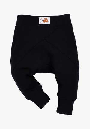 Zwarte katoenen babybroekjes met een kruislingse ontwerp en elastische tailleband. Heeft een label met een illustratie van een bruine hond aan de bovenkant.