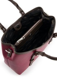 Maroon leather handbag with a textured finish, brown handles, and a zippered interior pocket, featuring a logo pattern lining.