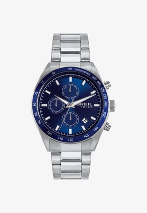 Rustfrit stål chronograph ur med en blå skive, hvide markeringer og subcifre. Funktioner inkluderer tachymeter og dato-display ved 6-tid.