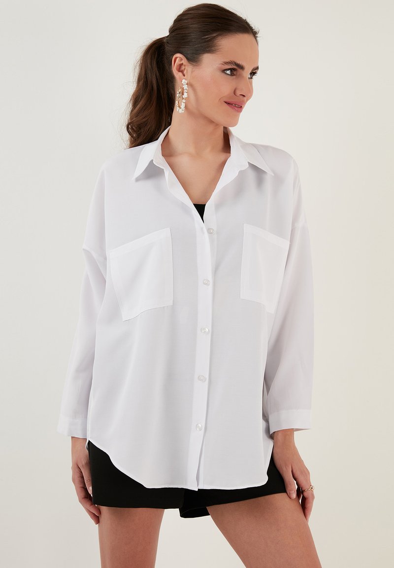 LELA LOOSE FIT Buttondown blouse white Zalando.ie