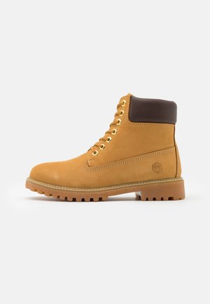 RIVER - Lace-up ankle boots - yellow/dark brown