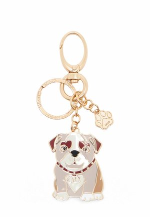 Portachiavi in tono dorato con un ciondolo a forma di cane stilizzato, arricchito da dettagli in smalto multicolore, tra cui un collare a forma di cuore e un ciondolo a forma di impronta di zampa.