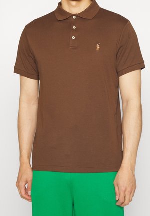 Braun Baumwollpolohemd mit Kragen, drei Knöpfen und gesticktem Logo. Kurzärmlig mit umgeschlagenen Ärmeln. Perfekt sitzendes Design.