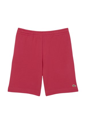 Shorts en coton rouge avec taille élastique, design à mi-genoux et un petit logo vert sur le bas à gauche.