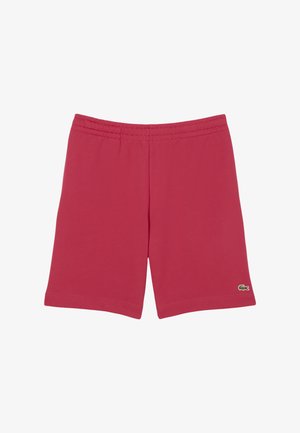 Shorts en coton rouge avec taille élastique, design à mi-genoux et un petit logo vert sur le bas à gauche.