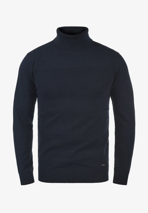 Granatowy sweter z golfem wykonany z gładkiej dzianiny, z wyrazistą poziomą wstawką na klatce piersiowej oraz prążkowanymi mankietami i dołem.