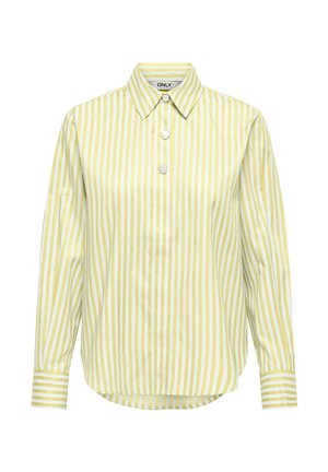 Lange mouwen gele en witte blouse met verticale strepen, een puntige kraag en drie grote knopen aan de voorkant.