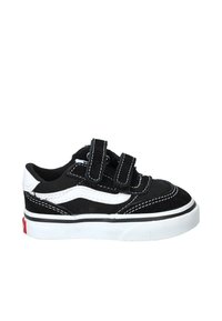 Zapatillas de lona negras con acentos blancos, que cuentan con correas de velcro, punta redondeada y suela de goma texturizada. El acolchado contrastante añade detalle.