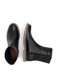Stivaletti neri in pelle con un design elegante. Cerniera laterale, suola in gomma e morbido rivestimento interno creano una calzata comoda.