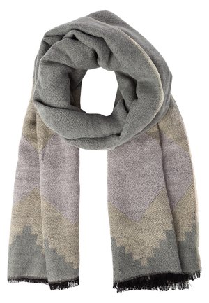 Écharpe douce en tissu tissé avec un motif géométrique dans des nuances de gris, beige et lavande, avec des bords frangés noirs.