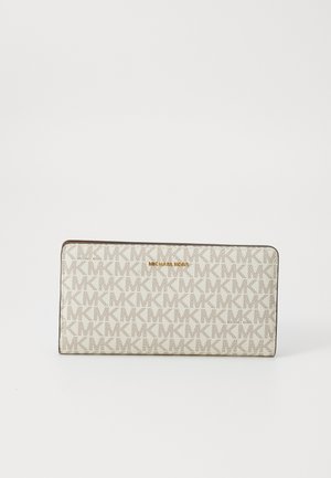 Michael Kors wallet, beige canvas with repeated monogram pattern, gold logo accents, slim rectangular shape, smooth texture.