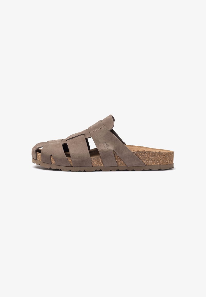Brown suede sandal with a cork footbed, featuring a strappy design and an open toe. Textured sole with a slight wedge for comfort.