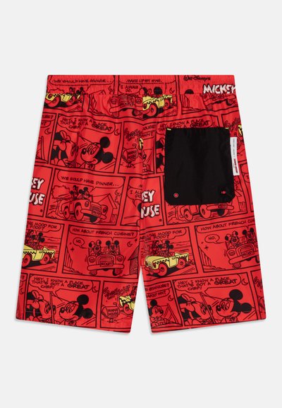 Červené šortky s potlačou v komiksovom štýle s Mickey Mouse a Minnie Mouse. Obsahujú čiernu nášivku na zadnej strane. Vyrobené z ľahkého materiálu.