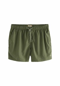 Rohelised ujumispüksid elastse vöökohaga, paeladega detail ja küljetaskudega. Sile tekstuur ja lõdvestunud lõige.