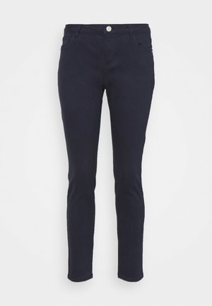 Jean skinny bleu marine en tissu doux en coton mélangé, avec une fermeture à bouton à l'avant, des passants de ceinture et deux poches arrière.