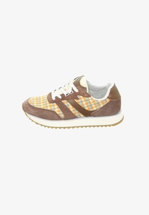 Brown and beige sneaker with white laces, orange and gray houndstooth fabric panels, and a textured rubber sole.