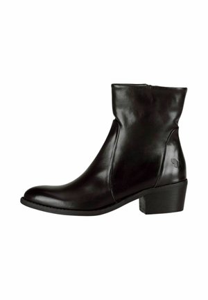 Bottine en cuir noir avec un bout arrondi, un design minimaliste, un talon bloc de hauteur intermédiaire et des accents latéraux subtils.