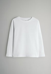 Witte lange mouwen t-shirt gemaakt van katoen. Het heeft een ronde halslijn en een gladde textuur met een ontspannen pasvorm. Geen zichtbare patronen of accenten.