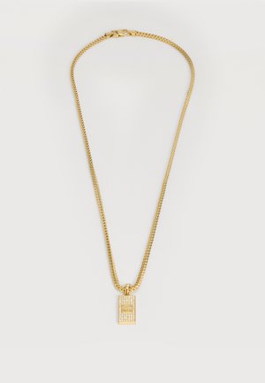 Kullast kett-kaelakee ristküliku kujulise ripatsiga, millel on keskel kuldne triip ning seda ümbritsevad read väikestest läbipaistvatest kivikestest.