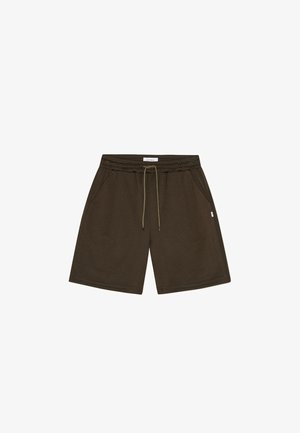 Donkergroene mesh shorts met een elastische tailleband, trekkoorddetail en zijzakken. Gladde textuur en een ontwerp tot aan de knieën.