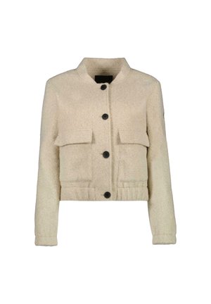 Crème-kleurige cropped jas van textuurstof, met een drukknoopsluiting en twee grote voorzakken.