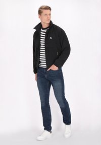 Schmuddelwedda Giacca da mezza stagione - black