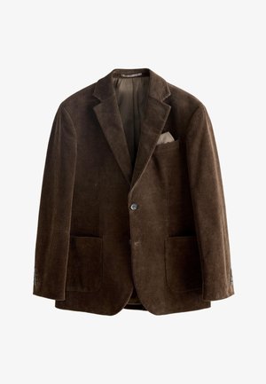 Hnědý manšestrový blejzr s výstřihem do klopy, dvěma předními kapsami a náprsní kapsou s světle zbarveným kapesníčkem. Zapínání na dvě knoflíky.