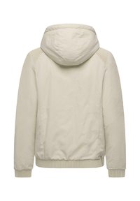 Jasnoskórzany beżowy kaptur z prążkowanymi mankietami i obręczą, wyposażony w teksturowane panele na ramionach oraz gładkie, matowe wykończenie.