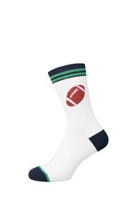 Calcetín blanco de algodón con puño a rayas verde y azul marino, con un gráfico de un balón de fútbol americano rojo en el costado y puntera y talón azul marino.