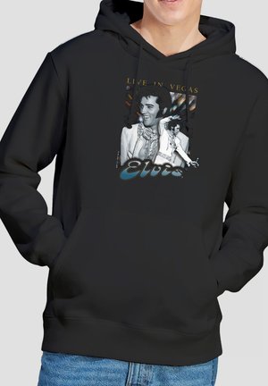 Black hoodie with two black-and-white Elvis Presley photos, "Live in Vegas" text above, and "Elvis" in large stylized letters below.