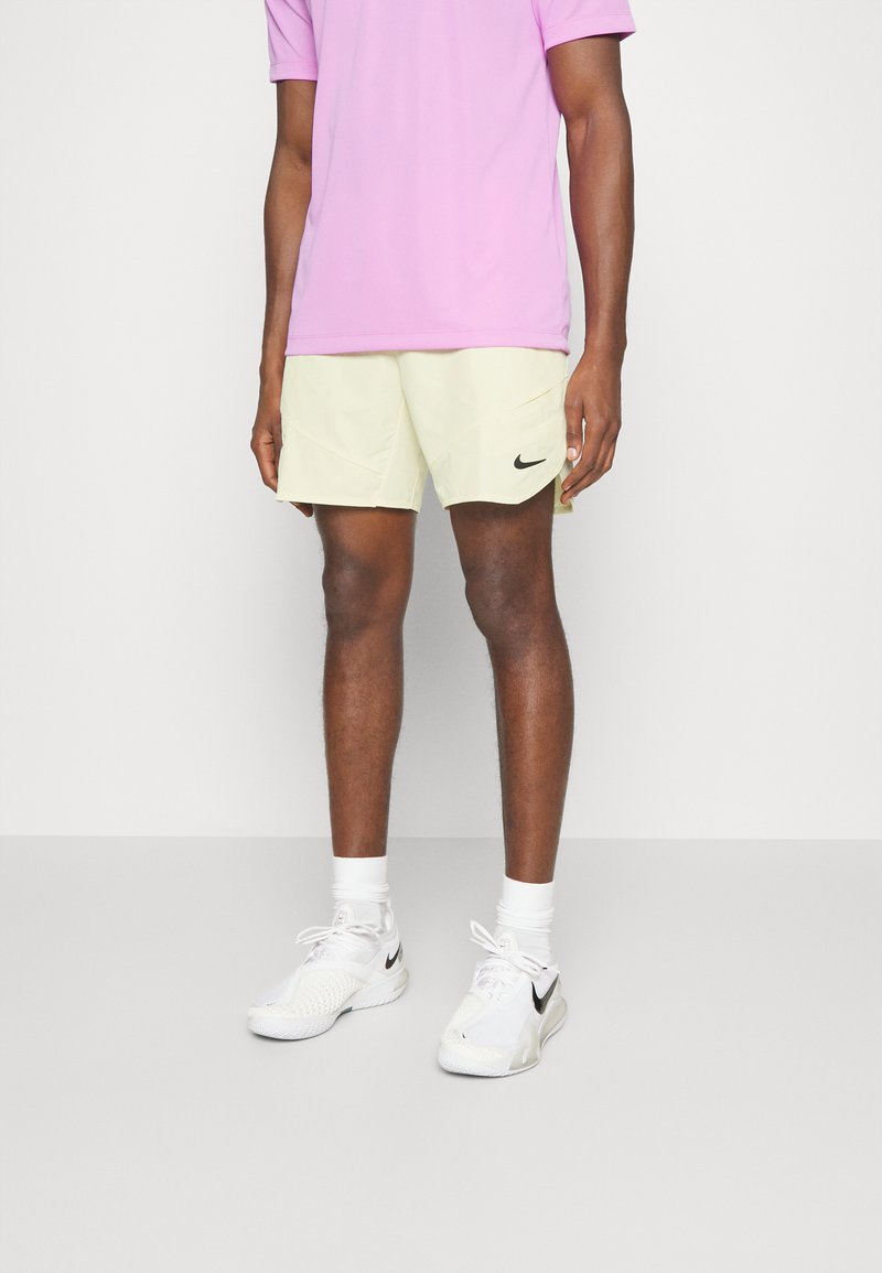 Nike Performance Sports shorts alabaster/black/light yellow Zalando