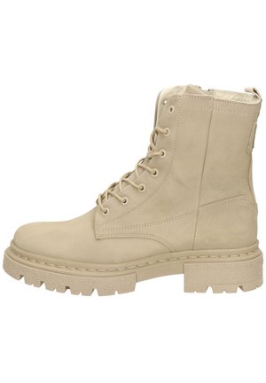 Botas de tobillo de cuero beige con cordones, suela gruesa, acabado texturizado, caña alta y cremallera lateral para mayor facilidad de uso.
