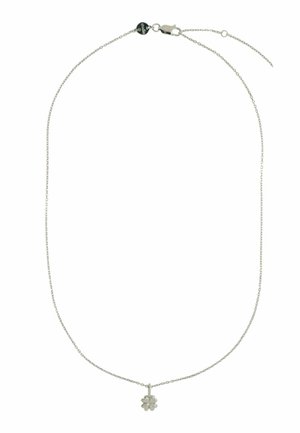 Collier chaîne en argent avec un petit pendentif en forme de fleur aux pétales détaillés et à la finition polie. Le fermoir est visible.