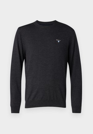 Gray crew-neck sweater made of soft fabric, featuring long sleeves and a small blue logo on the left chest. Smooth texture.